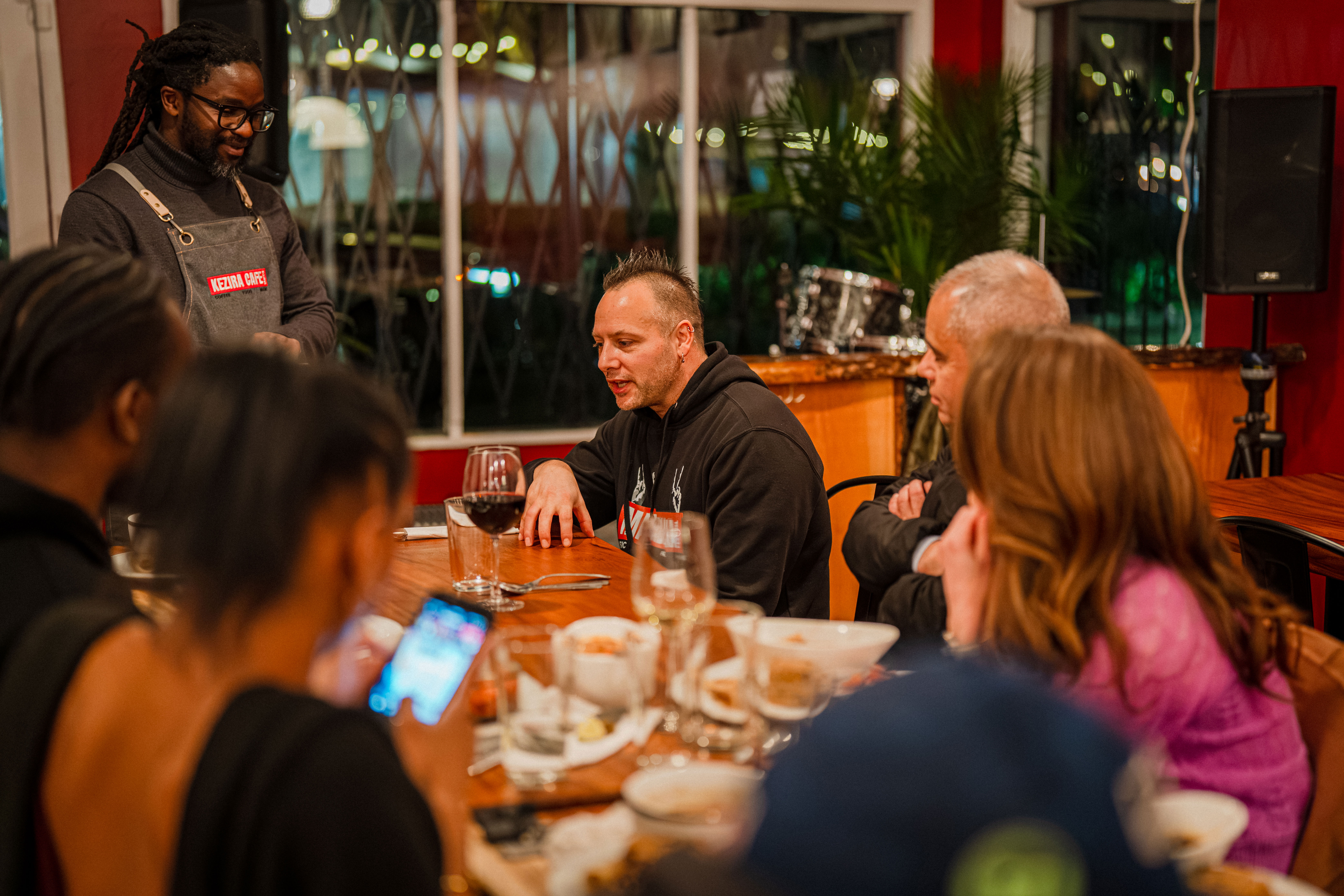 Social gathering with cocktails and food